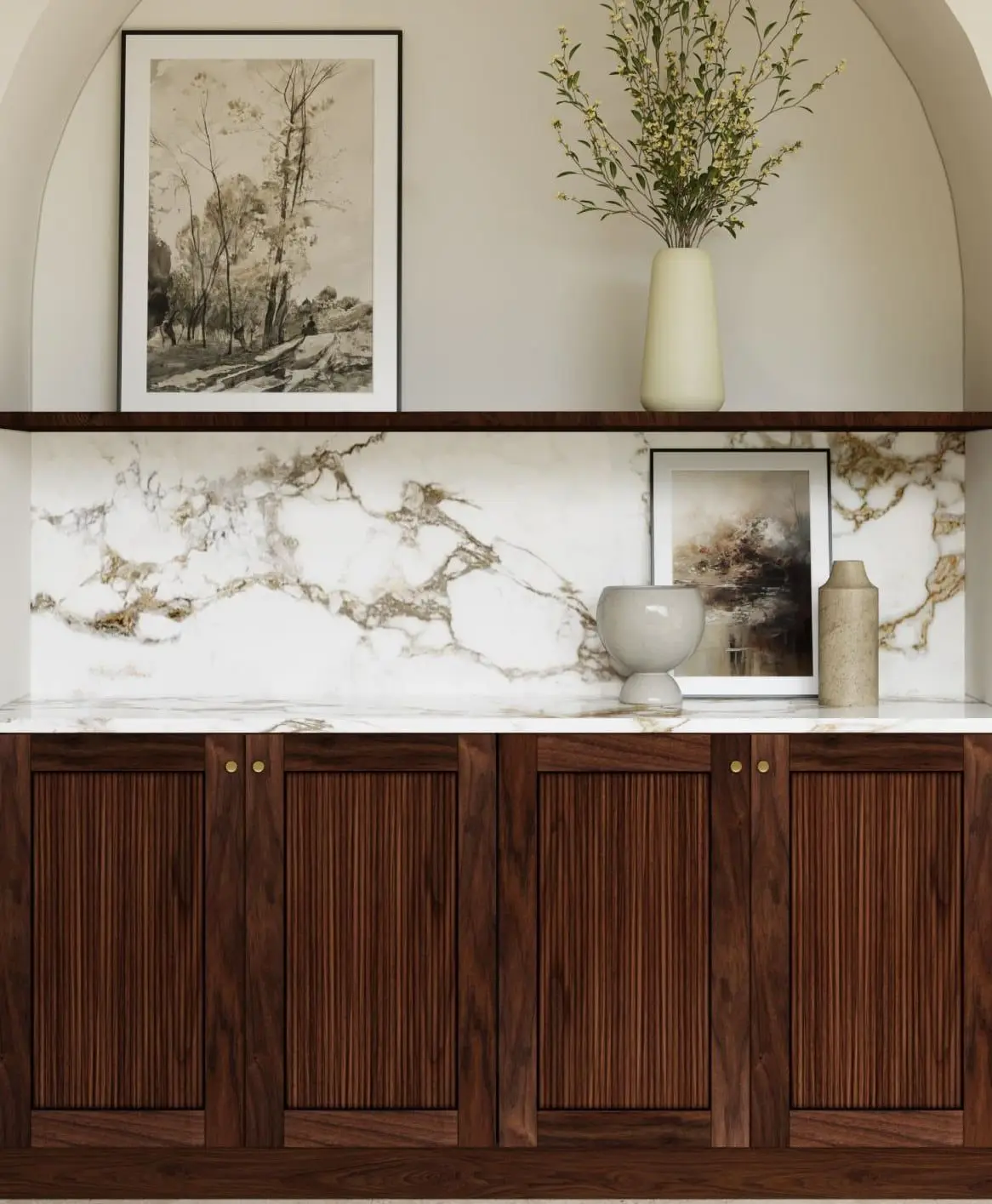 Reeded walnut Elmwood cabinetry under an arch, with a marble splashback and framed art
